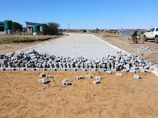 Amelia community project: paved road in Zamdela