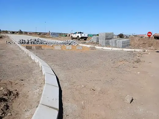Kerbing and edge restraints in place